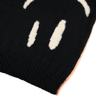 Smiley Face on Black Sweater 