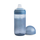 Blue sippy cup with matching lid on a white background
