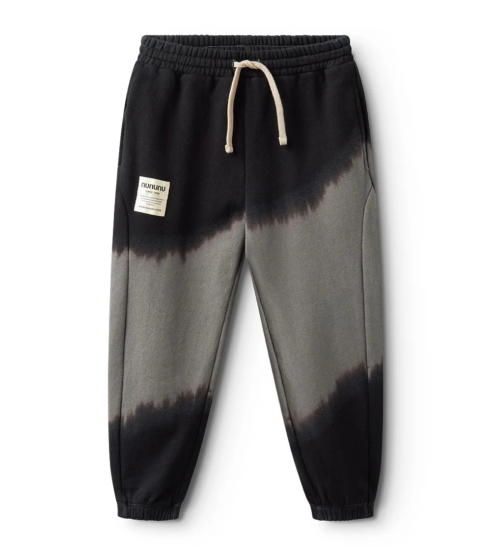 Tie-dye sweatpants with a gradient effect on a white background