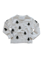 A cream-colored knit sweater with a pattern of small green pine trees, laid flat against a white background.