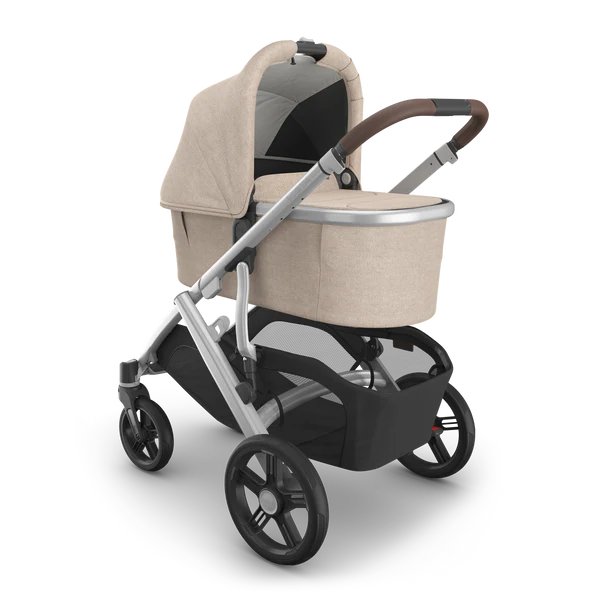 Light colored bassinet 