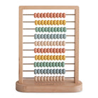 Wooden abacus with colorful beads on a white background
