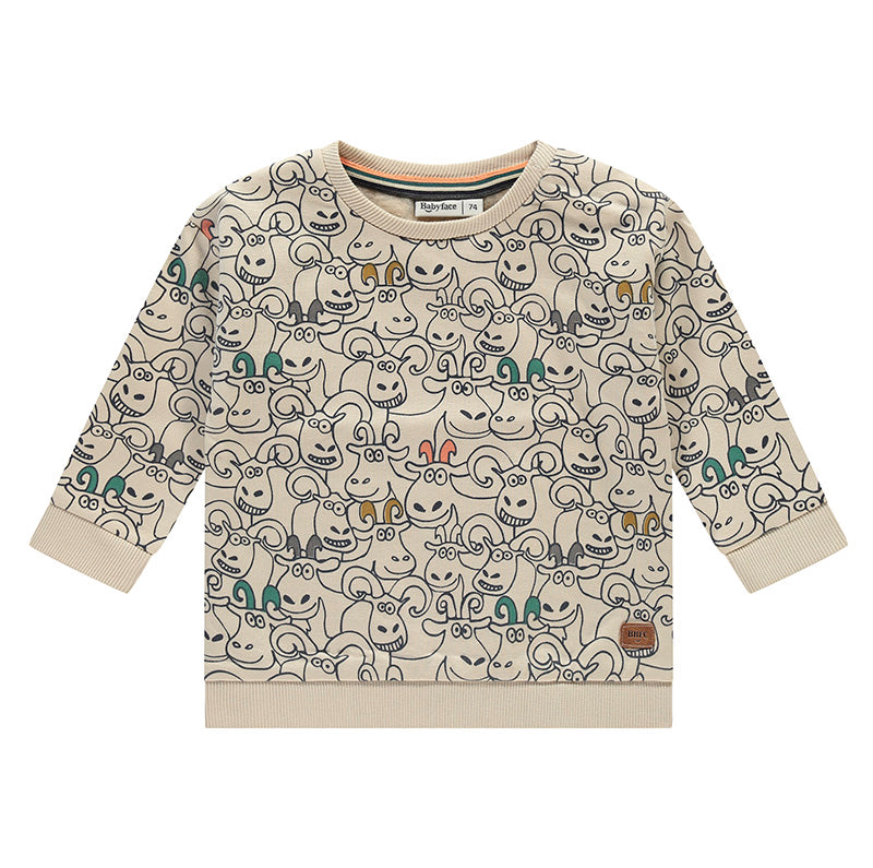 A baby boy's beige sweatshirt with a shell pattern and short sleeves.
