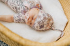 baby knotted hat with purple and pink floral pattern 