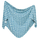 A blue checkered knit swaddle blanket.