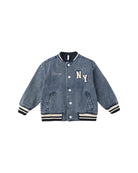 Denim jacket with 'NY' and 'Champ' text on a white background
