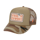 Camouflage baseball cap with 'Cool It Cowboy' patch on a white background