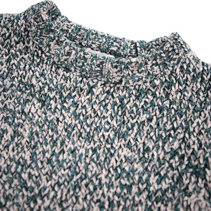 Close-up of a textured green and beige fabric with a collar.