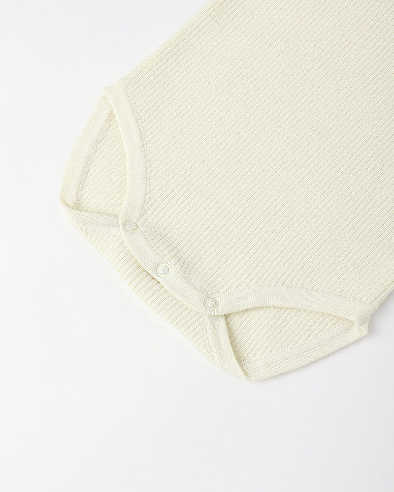 cream ribbed body suit with button bottom