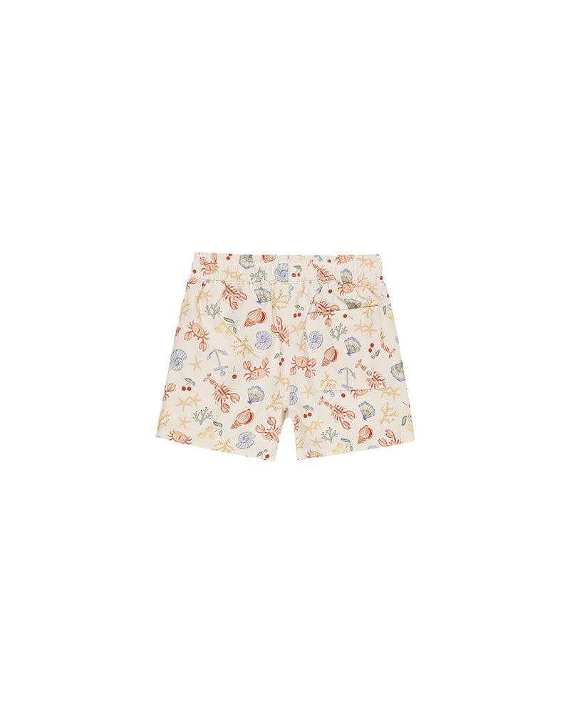 cream swimshorts with ocean animals 