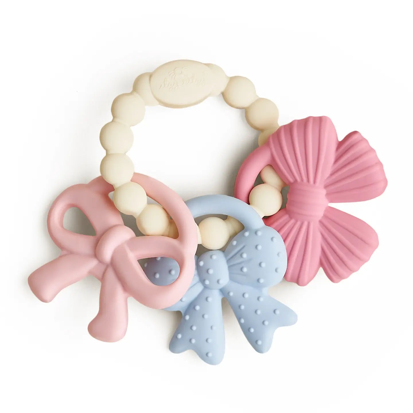 Set of three bow shaped colorful silicone teething rings on a white background