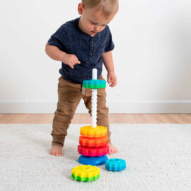toddler playing with spin toy