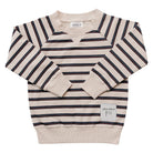 Beige, maroon, and navy striped sweater with brand label on a white background