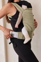 green baby carrier