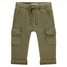 Green cargo pants with a drawstring on a white background