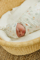 swaddled sleeping baby