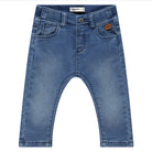 Mid wash blue denim baby boys' pants with a button and zip closure, featuring an elasticated waistband and belt loops.