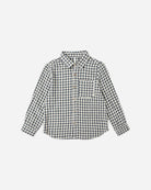 navy and cream plaid button up shirt against a white background 