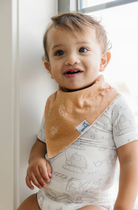 orange bandana bib with white trucks 