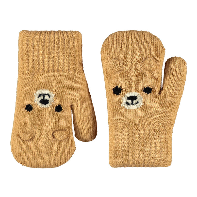 Pair of tan knit mittens with dog face design on a white background
