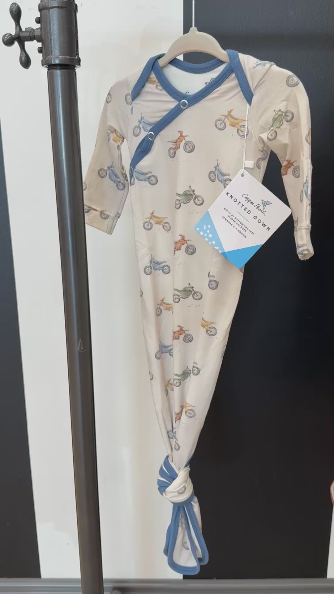 video of newborn knotted gown with dirt bike pattern 