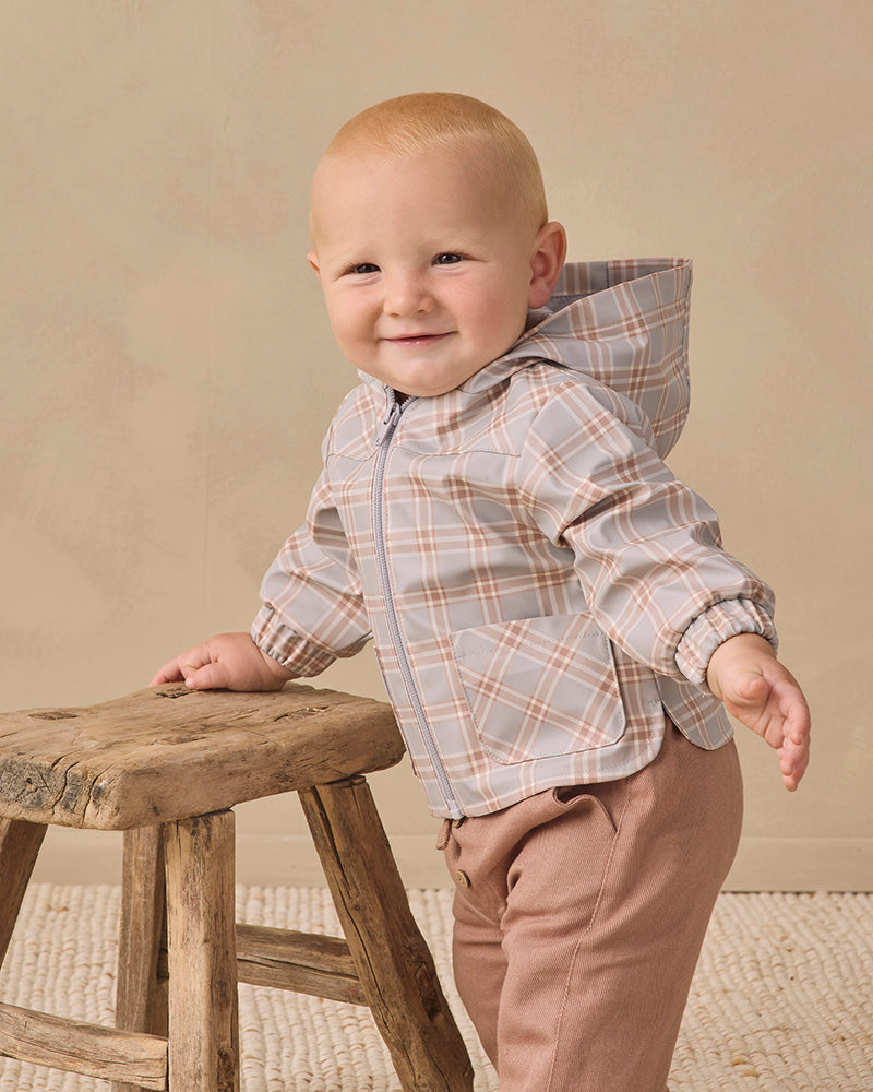 A hooded zip-up jacket for toddlers, featuring a light gray and beige plaid pattern with a light gray zipper and elasticized cuffs, shown against a plain white background.