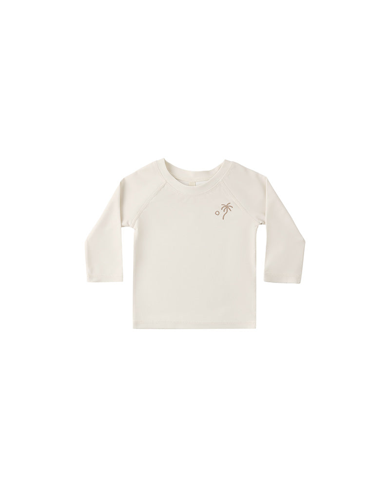 White long-sleeve shirt with a small palm tree design on a white background