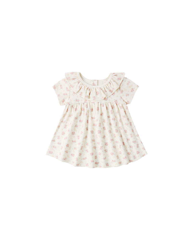 Pink floral dress on a white background