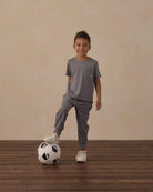 Gray athletic style t-shirt with a pocket on a white background