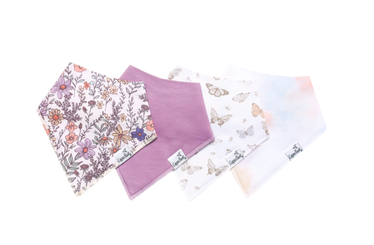 A set of four multicolored bandana bibs for babies, displayed on a white background.