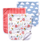 A set of three burp cloths with farmstead designs, including patterns of barns, clouds, and animals on a white background, and a solid blue burp cloth.