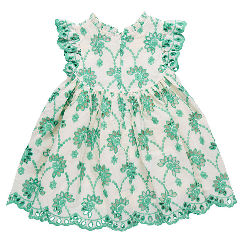 Green and white floral dress with ruffled details on a white background