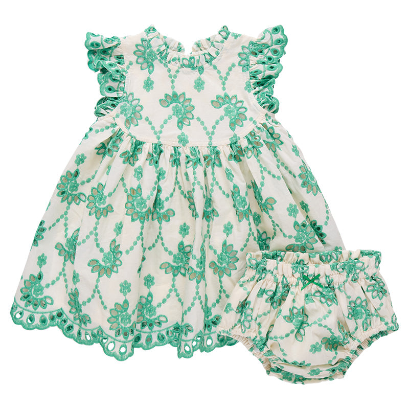 Green and white floral baby romper on a white background