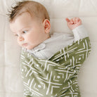 green mudcloth print swaddle