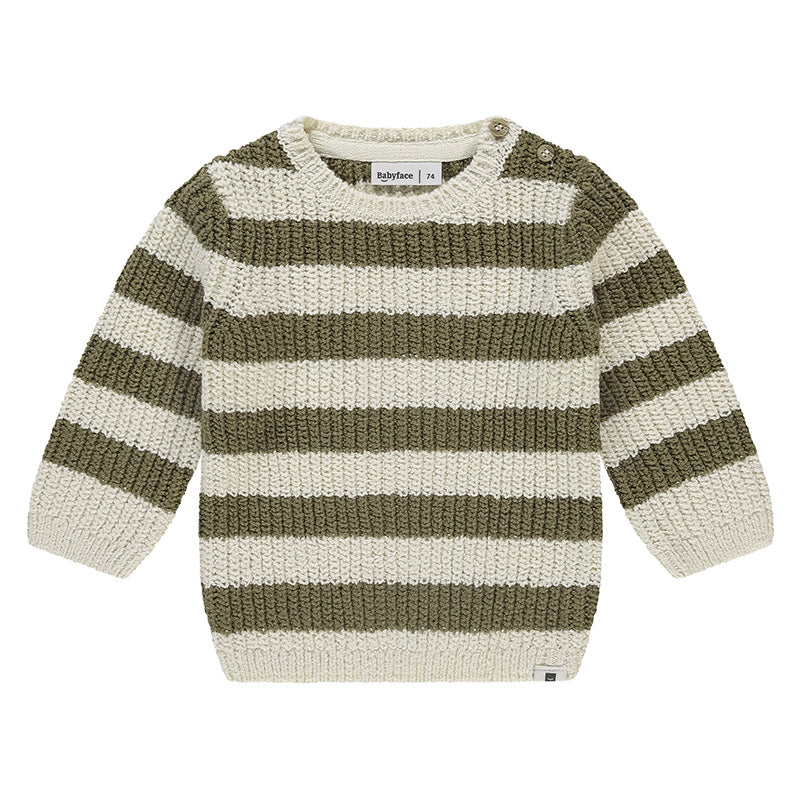 Striped sweater with green and beige pattern on a white background