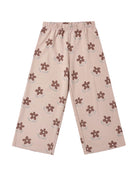Purple floral-patterned wide leg pants on a white background