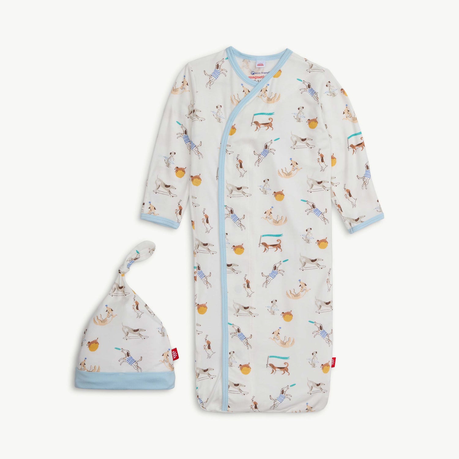 Baby gown with dog sports pattern and matching hat on a white background
