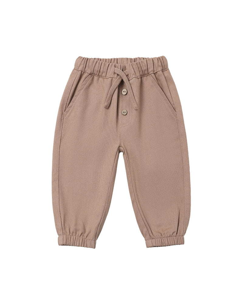 Brown children's pants with pockets, buttons, and an elastic waistband on a white background.