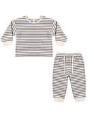 A two-piece children's outfit set featuring a long-sleeve top and matching pants, both with horizontal gray and off-white stripes, laid flat on a white background.