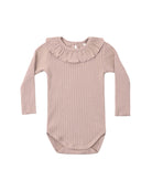 Pink ribbed baby bodysuit with ruffled collar on a white background