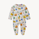 Baby onesie with colorful train pattern on a white background