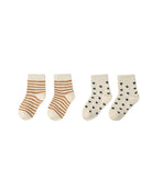 Two pairs of socks with striped pattern and star pattern on a white background