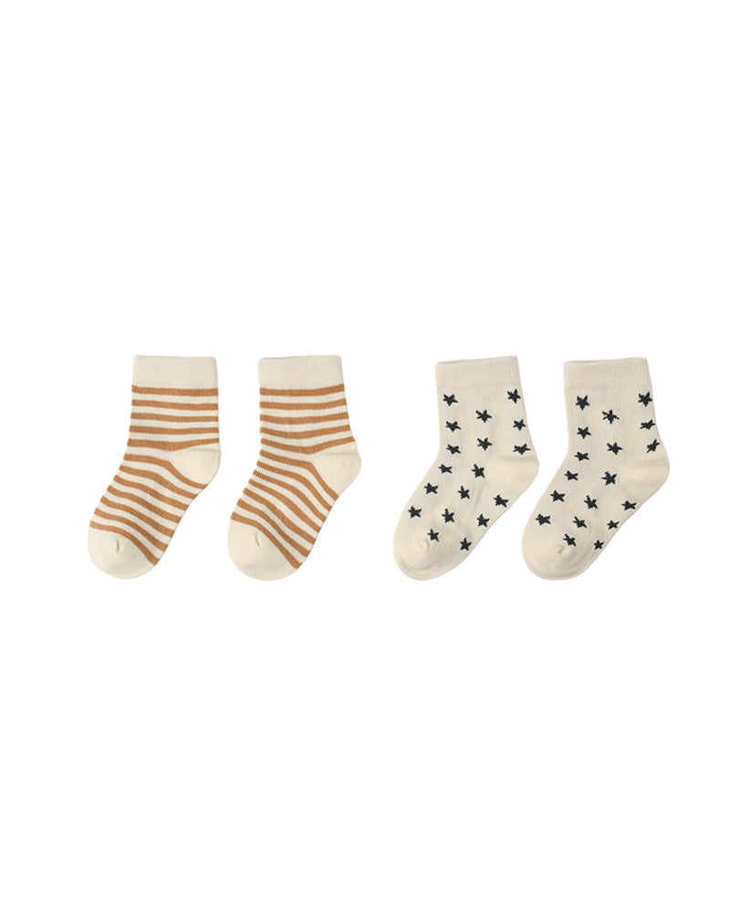 Two pairs of socks with striped pattern and star pattern on a white background