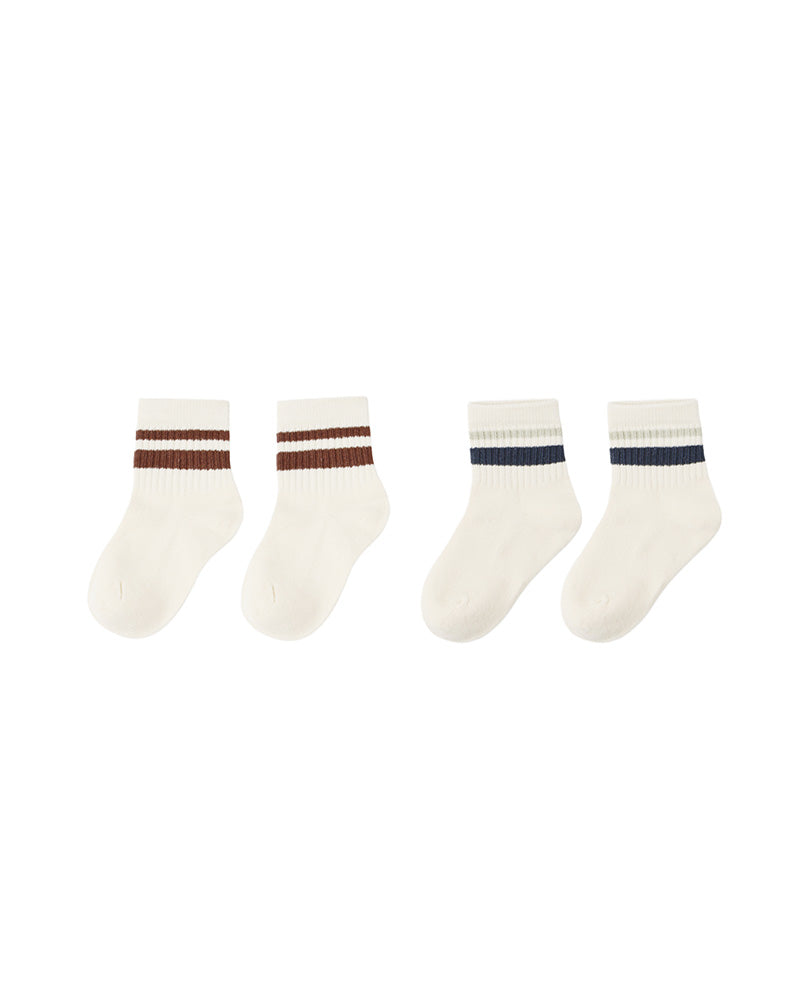 Set of two pairs of ribbed multicolor socks with striped cuffs on a white background