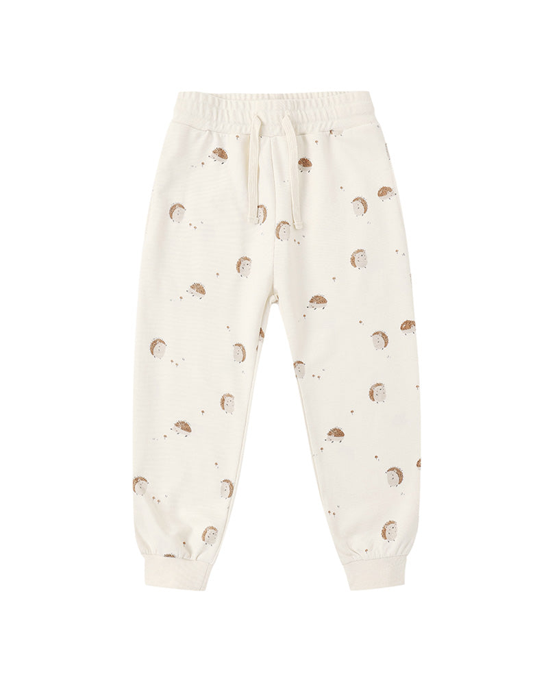 White sweatpants with brown porcupine pattern and a drawstring on a white background