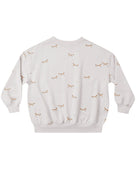 Light gray sweatshirt with small fox patterns and cuffed sleeves on a white background