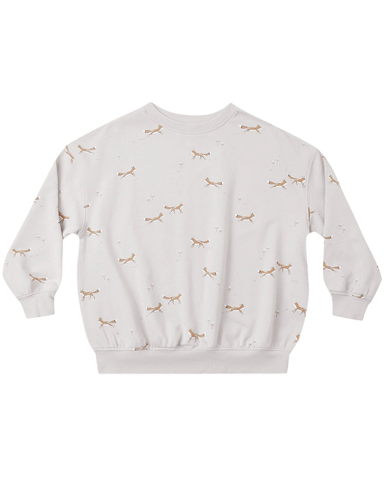 Light gray sweatshirt with small fox patterns and cuffed sleeves on a white background