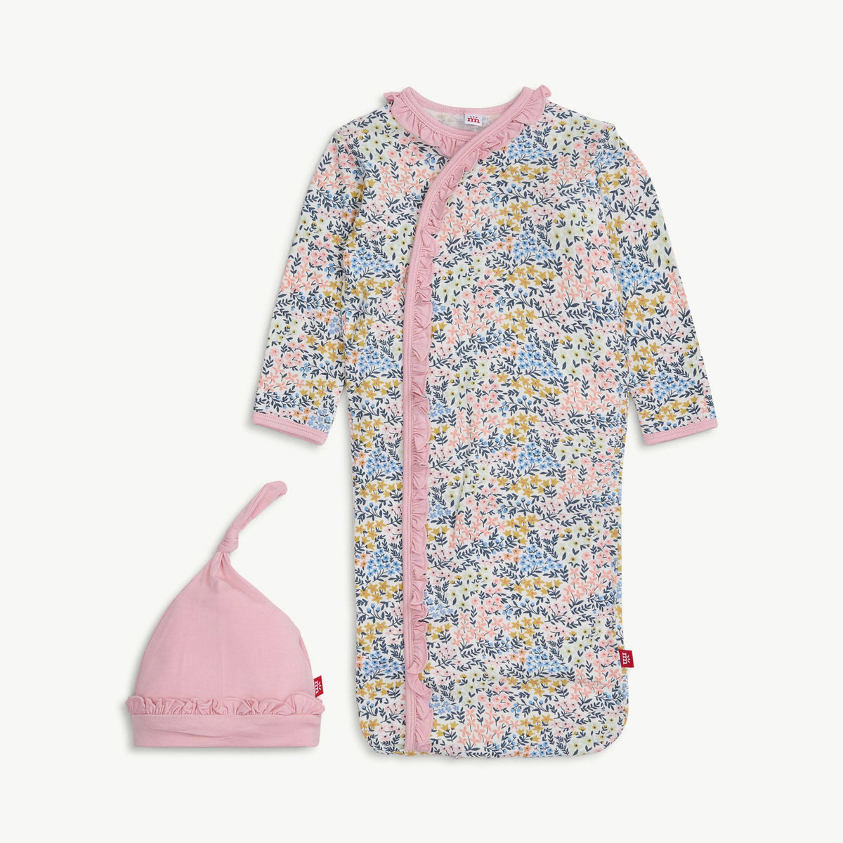 Baby onesie and hat set with pink ruffle trim and a floral pattern