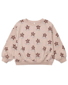 Pink sweatshirt with flower pattern and cuffed sleeves on a white background