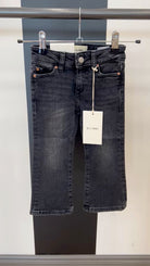 video of black DL jeans on hanger 